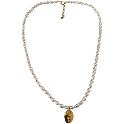 Baroque pearl necklace with flower 18k gold