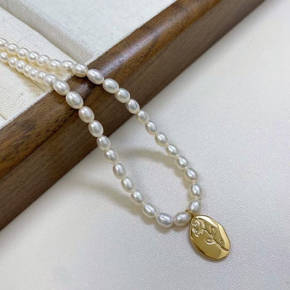 Baroque pearl necklace with flower 18k gold